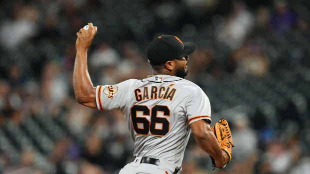 SF Giants left-handed reliever Jarlín García throws a pitch. (2022)